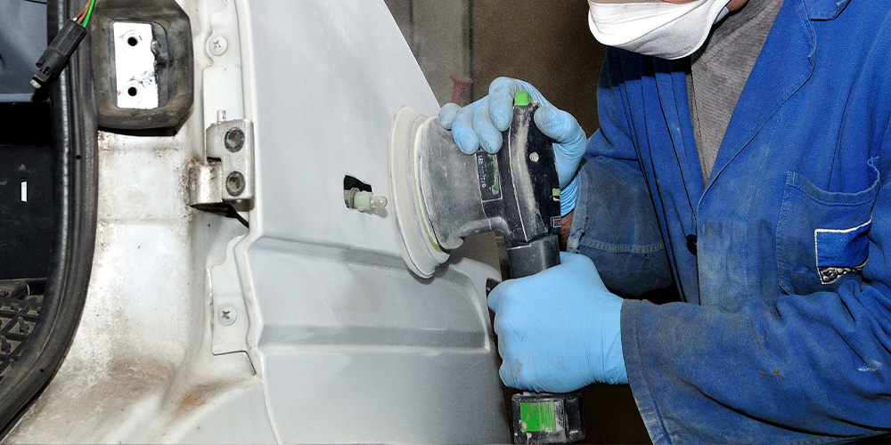 Image of a Employee Doing Auto Body Repair